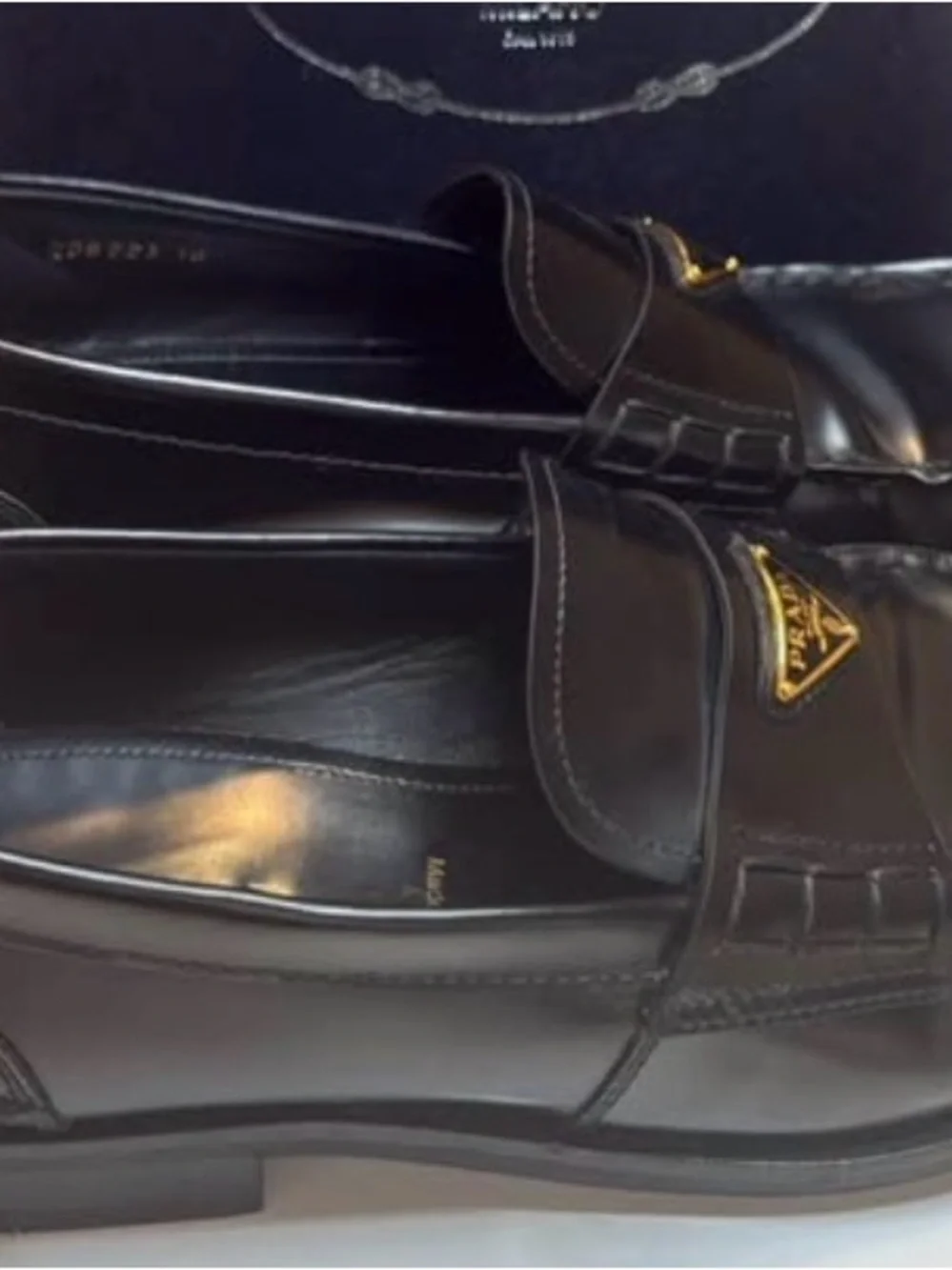 Prada Black Leather Men's Slip-On Loafers with Gold Logo